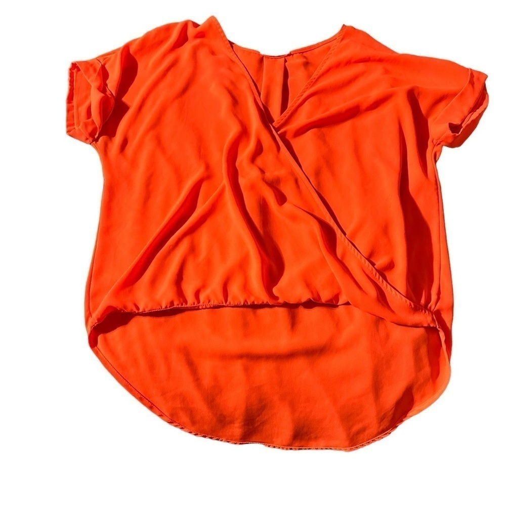 Lush women's  neon orange v-neck twist blouse, longer in the back